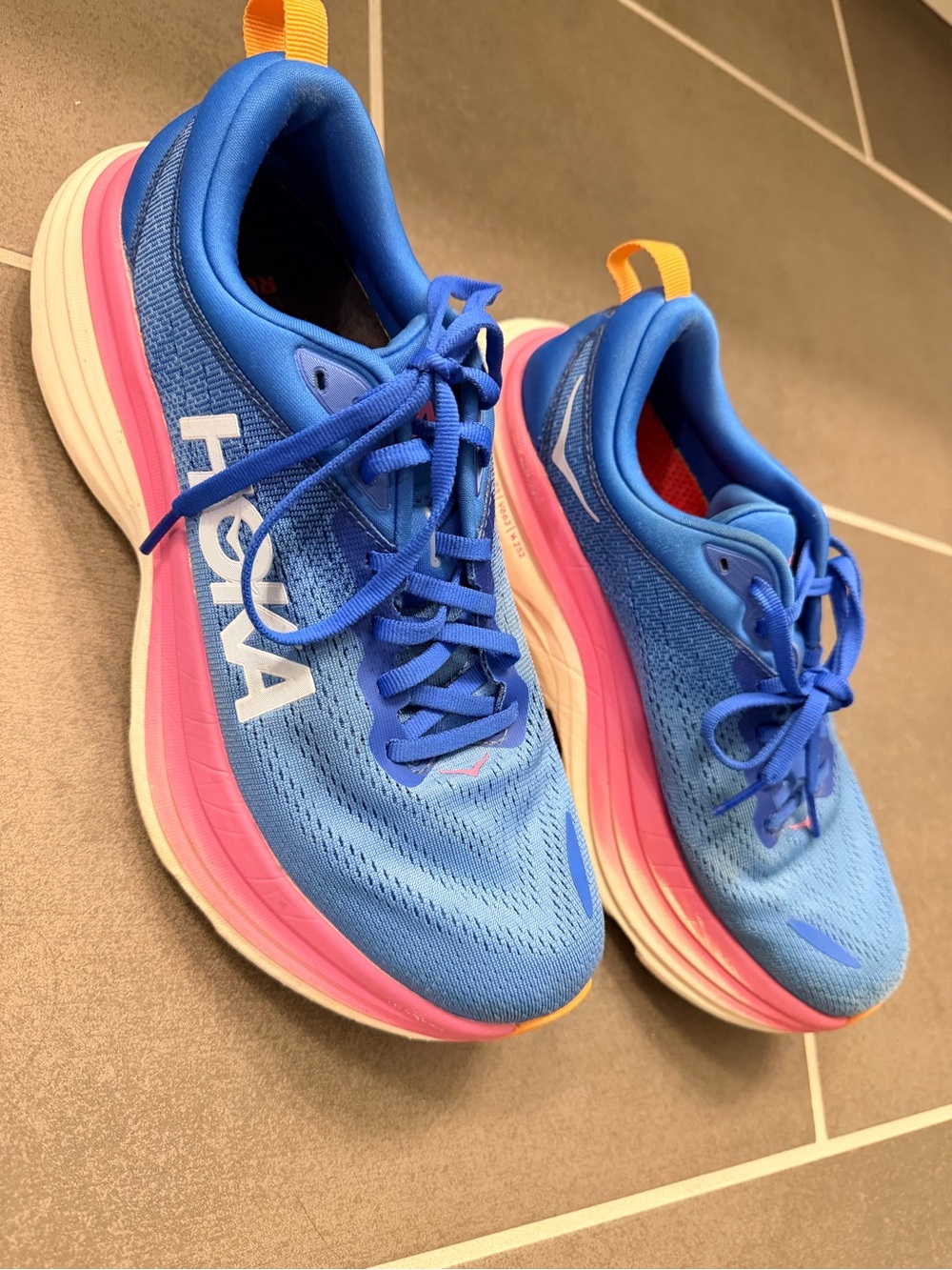 Hoka Women's Blue Running Sneakers with Pink and Yellow Accents